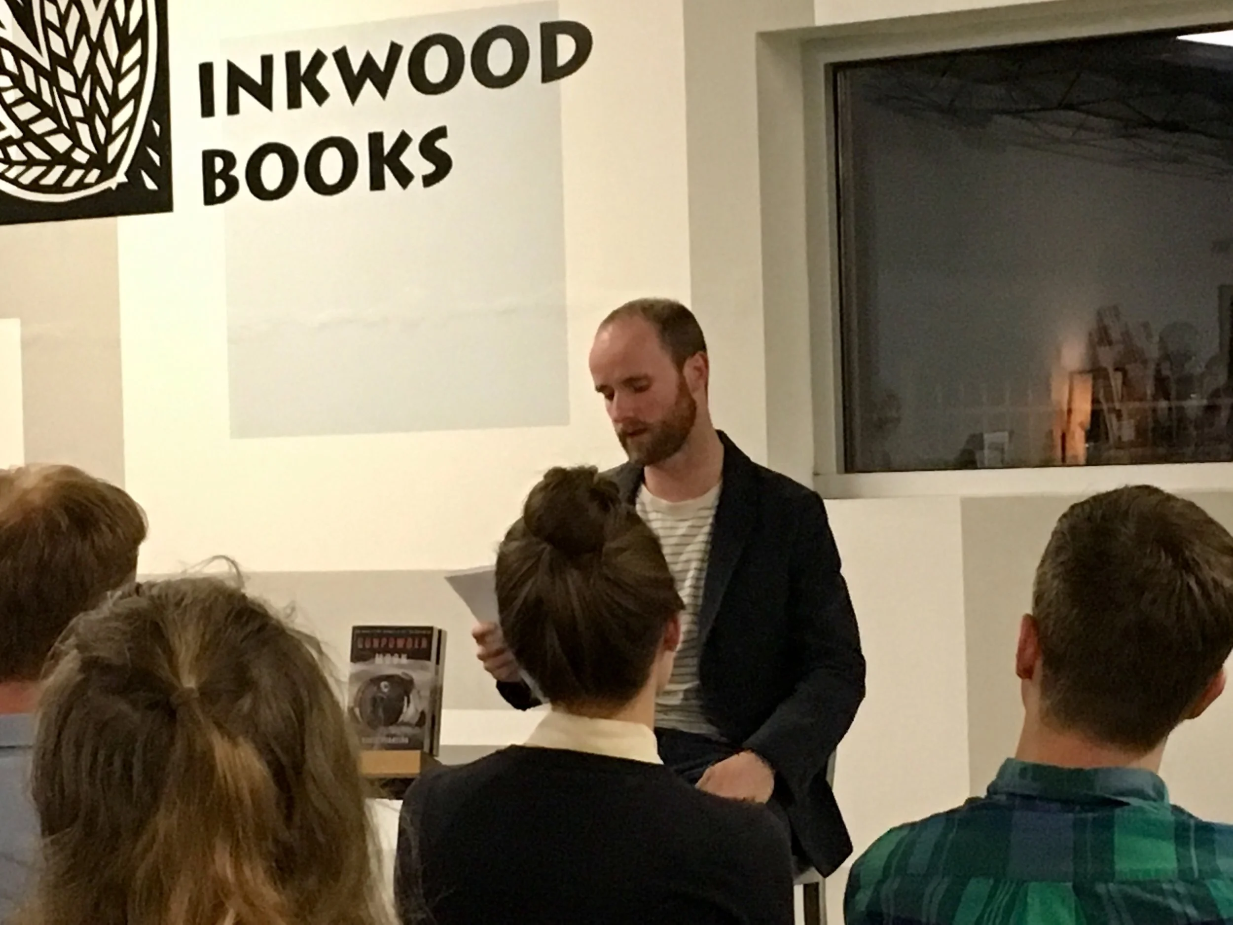 Evidently another author's book sat behind me on the table as I read. Unconscionable. (Actually, I didn't mind: and it's Gunpowder Moon by David Padreira, another Tampa-area author. And I hear it's very good!) 
