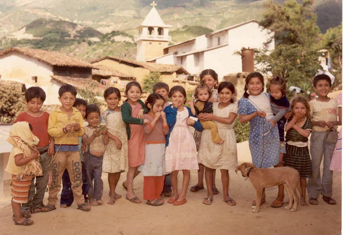 The children of Pacaipampa, Peru. &nbsp;The church in the background has been faithfully served by the Augustinians in Peru for 30 years