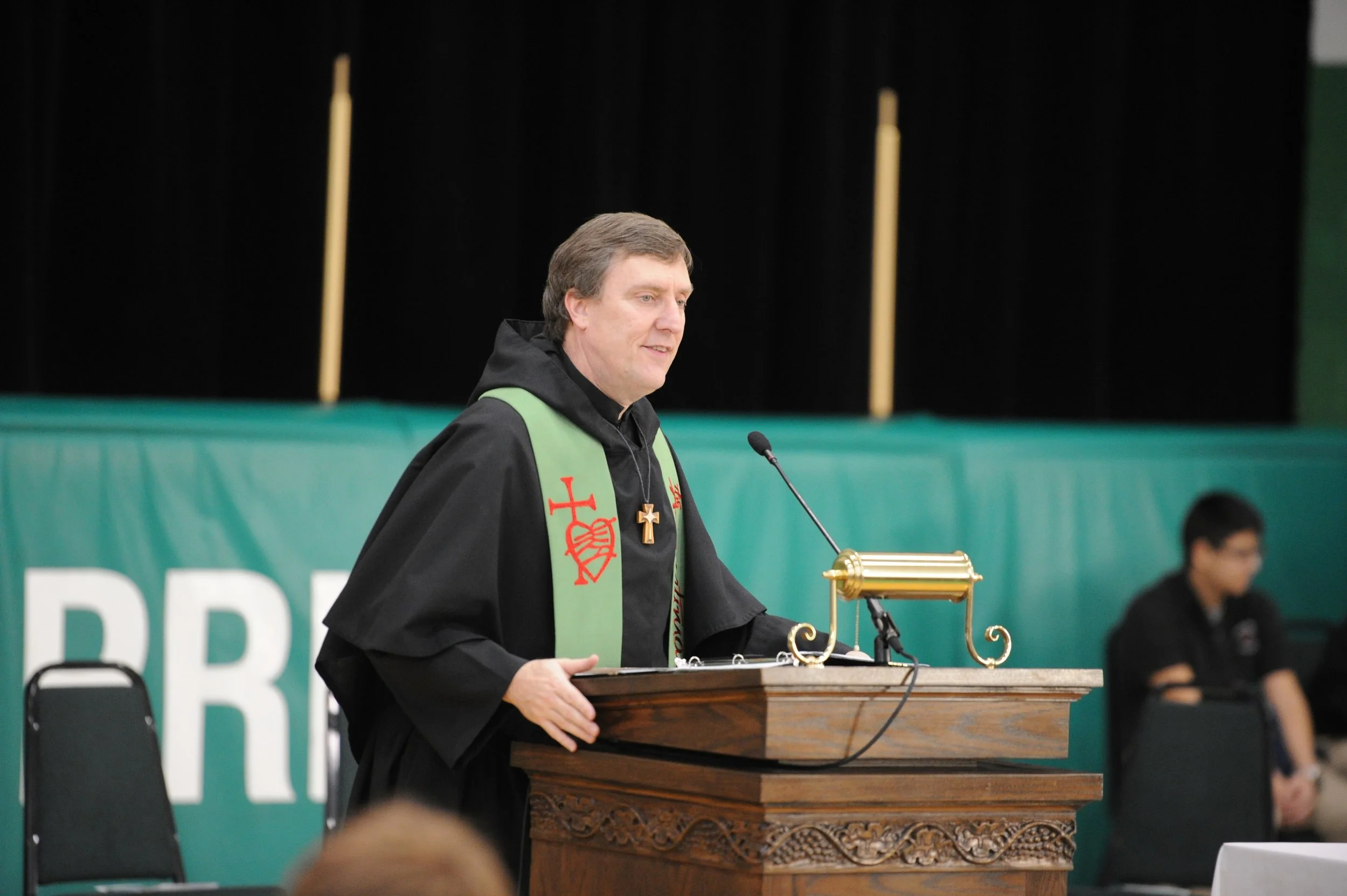 Father Merkelis is now a beloved priest on the campus of Providence Catholic High School in New Lenox, Illinois