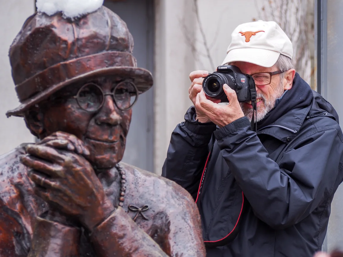 Author Ted Bishop and Barbara Patterson's Women Are Persons! sculpture in Olympic Plaza. Photo: Leo Aragon