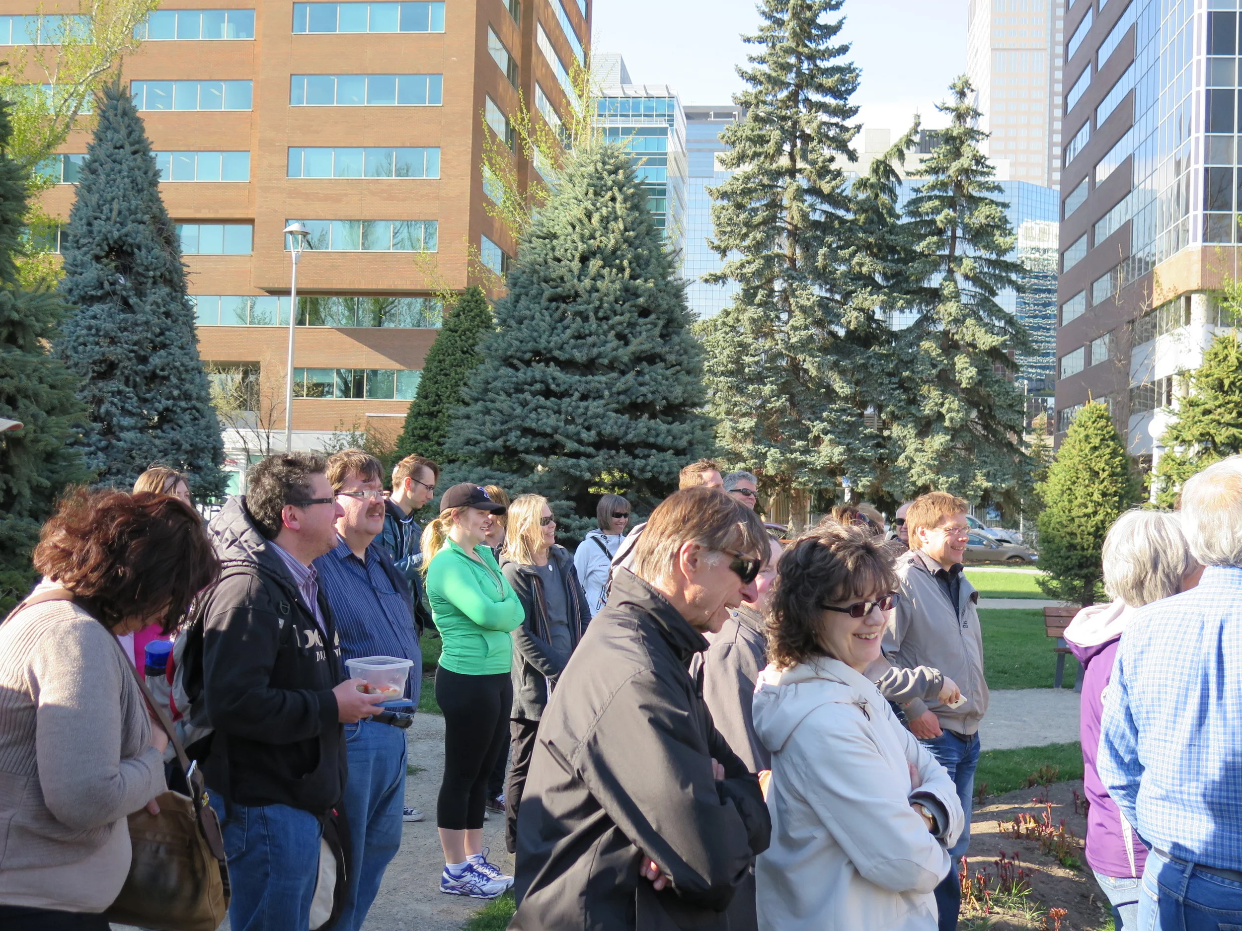 Central Memorial Park: the crowd listens to the Calgary poems of Maxwell Bates and Lisa L. Moore, a Calgary native now living and teaching in Austin TX. One of Moore's Calgary poems is called " Cold Garden ," the Old Norse words for Calgary Bay on Colonel James Macleod's ancestral homeland on the Isle of Mull.