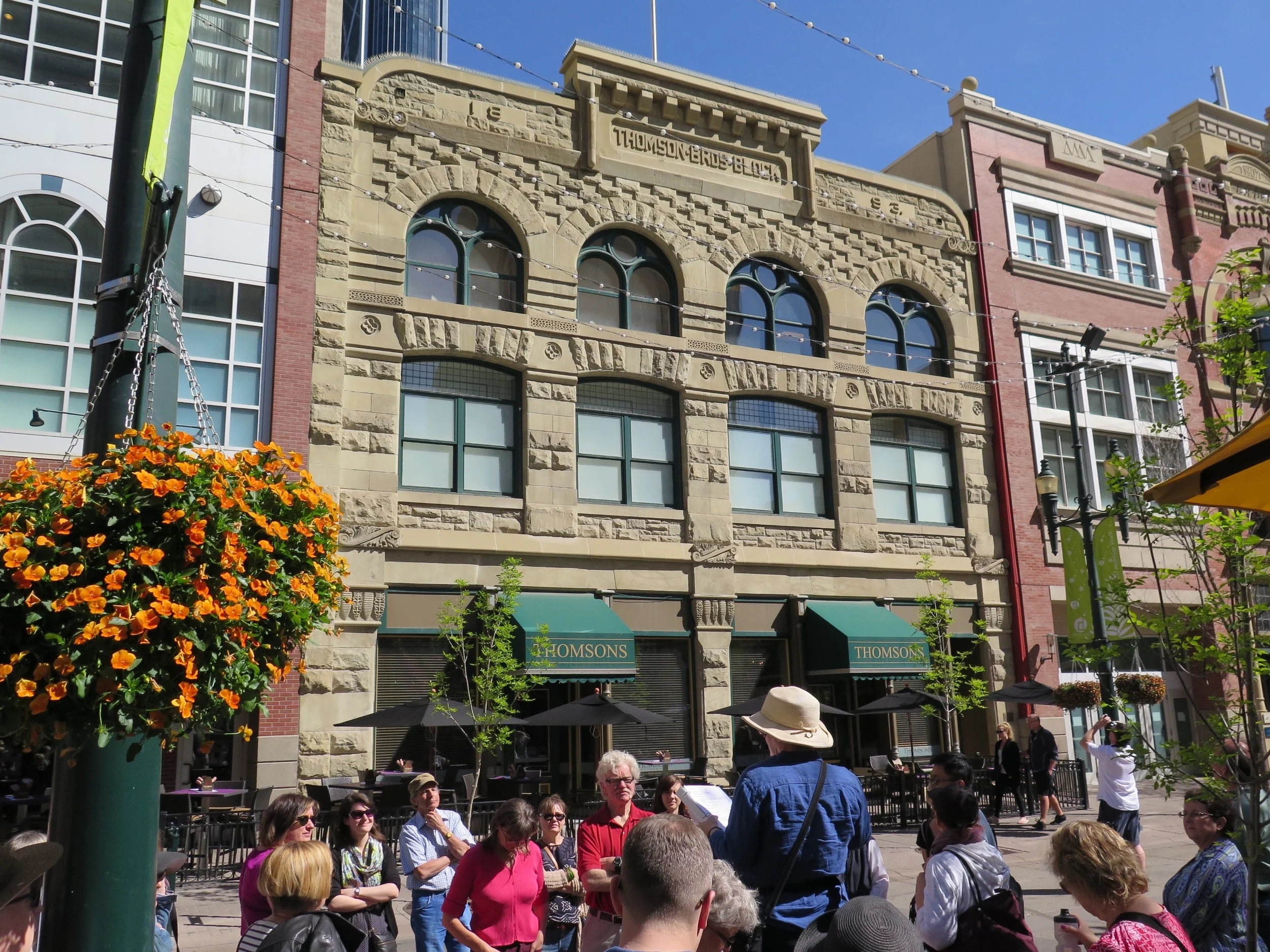 Stephen Avenue: a look at Calgary's early bookstores, Thomson Bros Bookstore (namesake of the restaurant) and Linton's Bookstore circa 1890. The avenue was also home to several theatres, including the Starland, which Marina Endicott uses as one of the Calgary settings in her 2012 vaudeville novel, The Little Shadows. ( Photo: Blair Carbert)