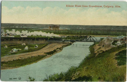 A steam engine crossing the Elbow River seen from a bluff in what we now call Ramsay, an area once known as Grandview. (Photo: Calgary Public Library Postcards from the Past )