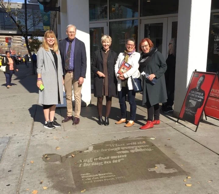 On launch day, a few members of the #YYCLiterarySidewalks team: Shelley Youngblut (WordFest), Bill Ptacek and Rosemary Griebel (Calgary Public Library), me, and Aritha van Herk (author). Missing: Micheline Maylor (Calgary Poet Laureate), and all the swell WordFest staff and Library people who helped bring this project to the streets.
