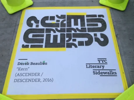 In front of Pages bookstore on Kensington Road, derke beaulieu's concrete poem, "kern."