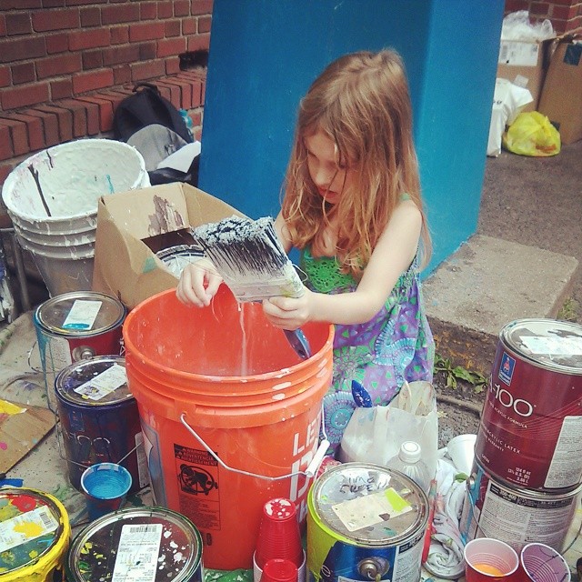 She was elbow deep in the water trying to clean the brushes. One of our helpers for the evening! 
