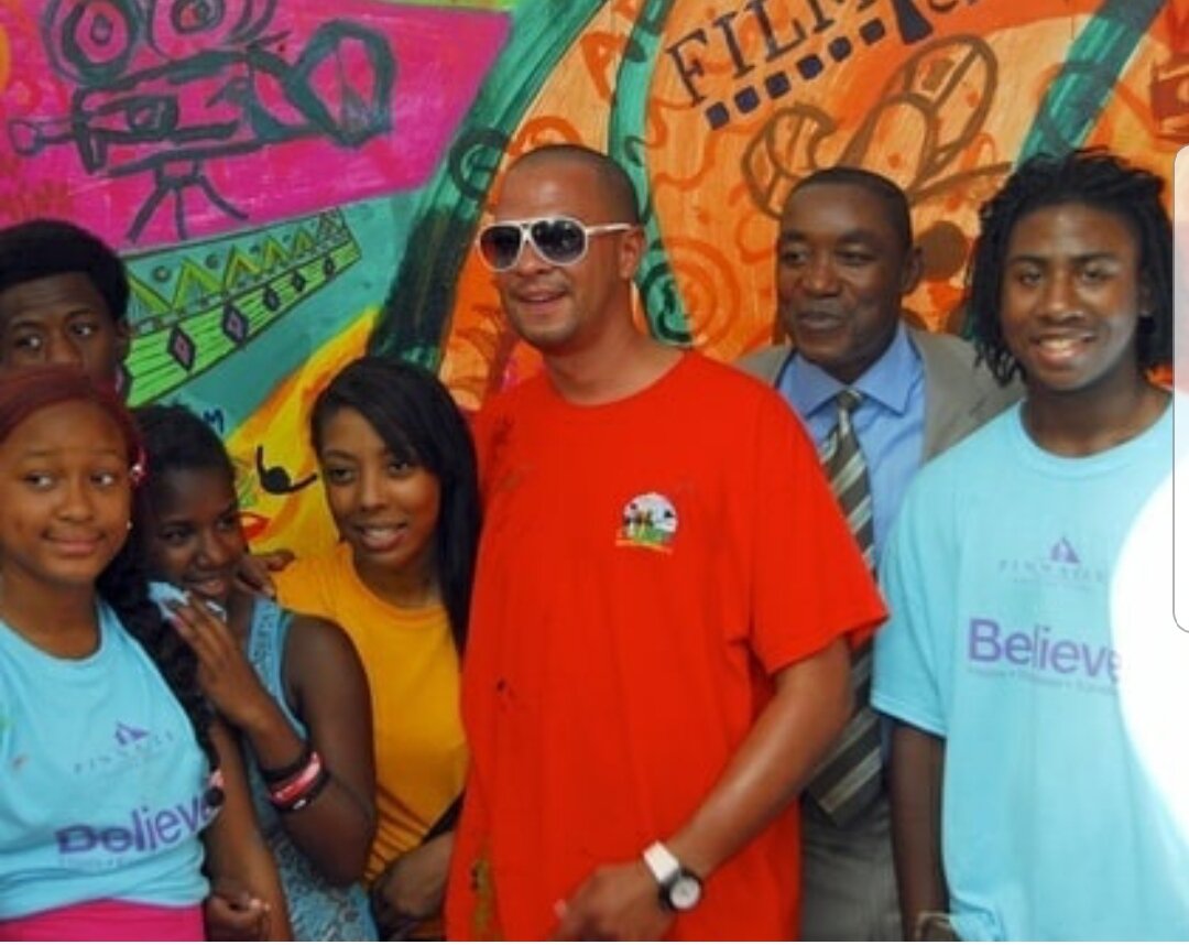 Kyle Holbrook, Isiah Thomas and MLK Mural Youth..jpg