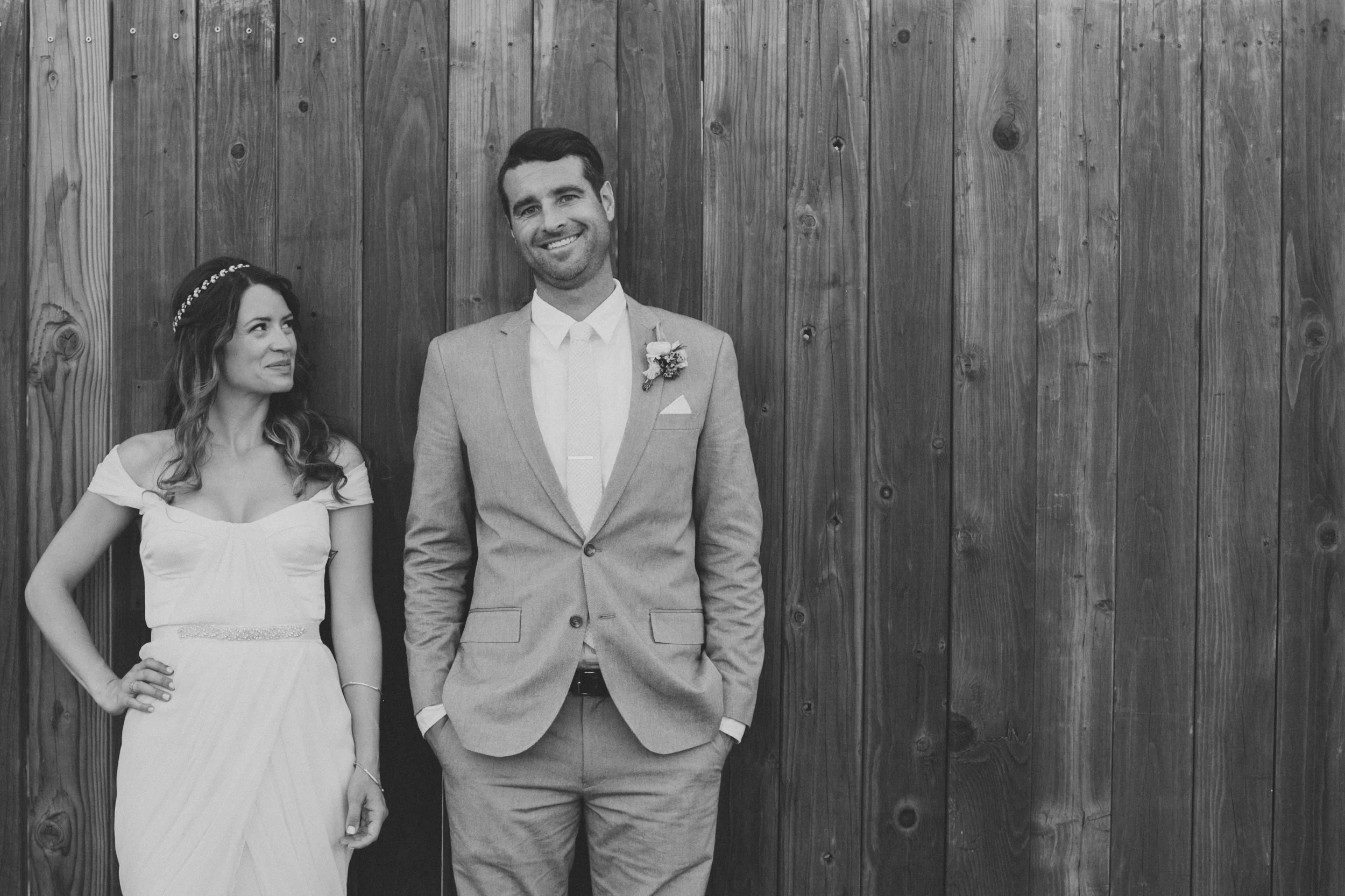 bride in winifred bean tulipe dress, groom in grey suit