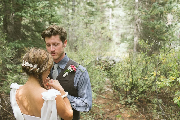 First look in Winifred Bean rustic Colorado wedding featuring Daisy chiffon dress