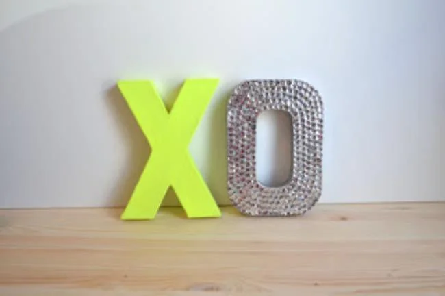 glittering and neon XO sign as wedding decor