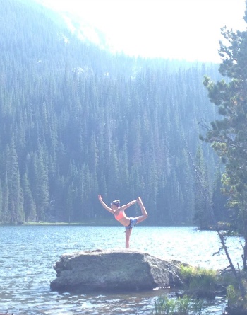 Zoe enjoying two of her loves: yoga and nature