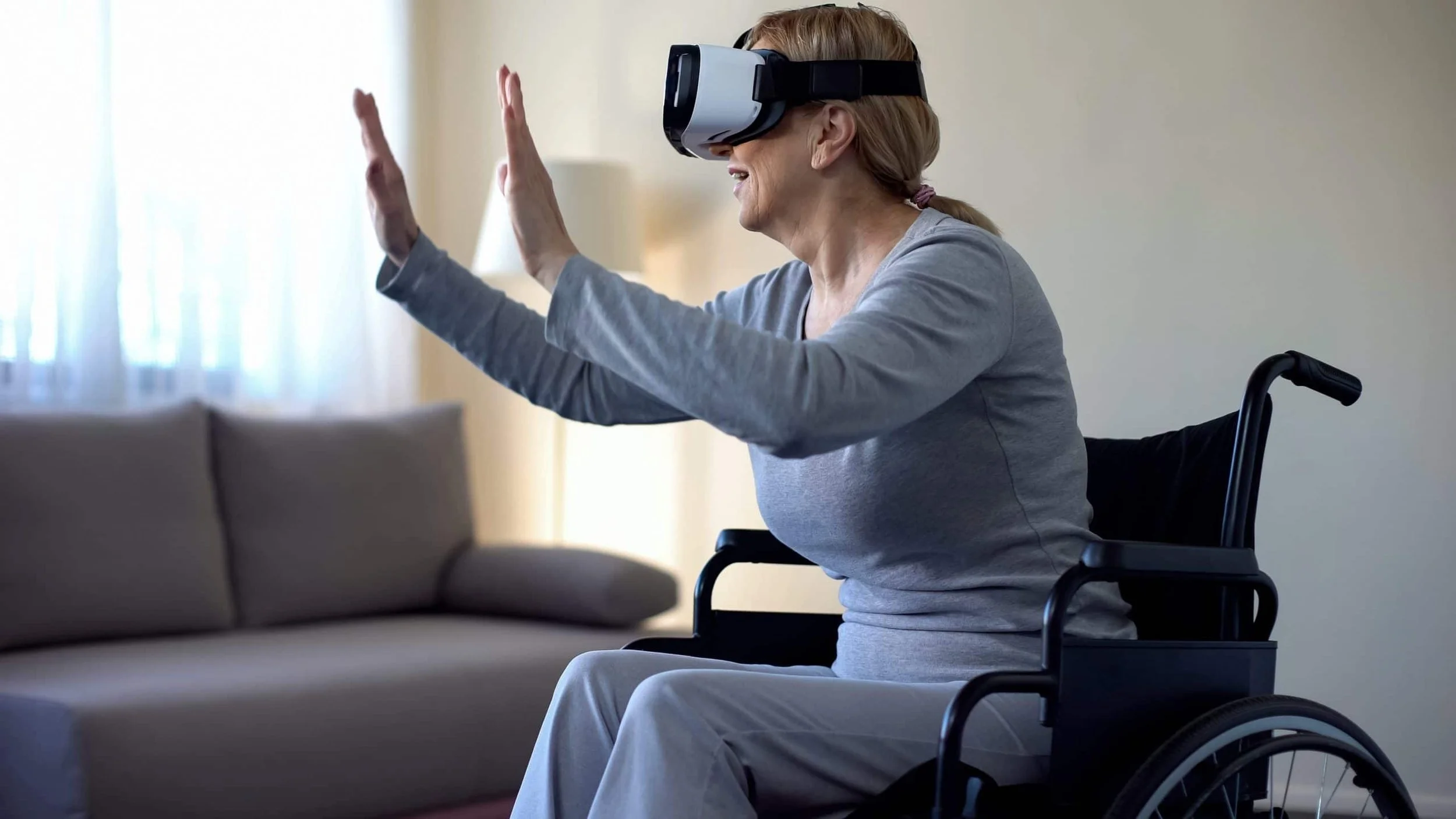 Woman-in-Wheelchair-with-VR-Headset.jpg