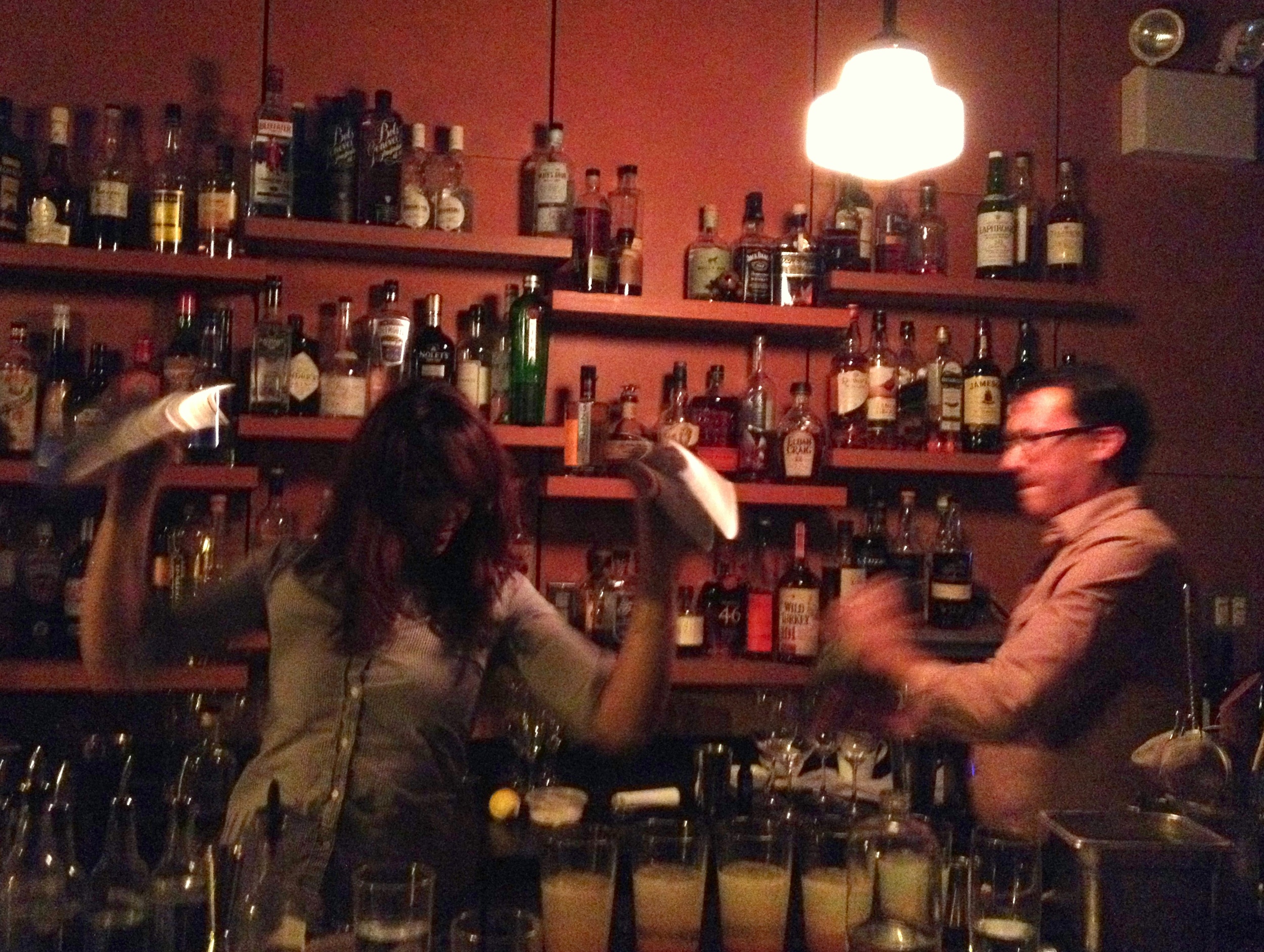 Bartenders shake the dessert cocktail, made of seaside rose hip syrup