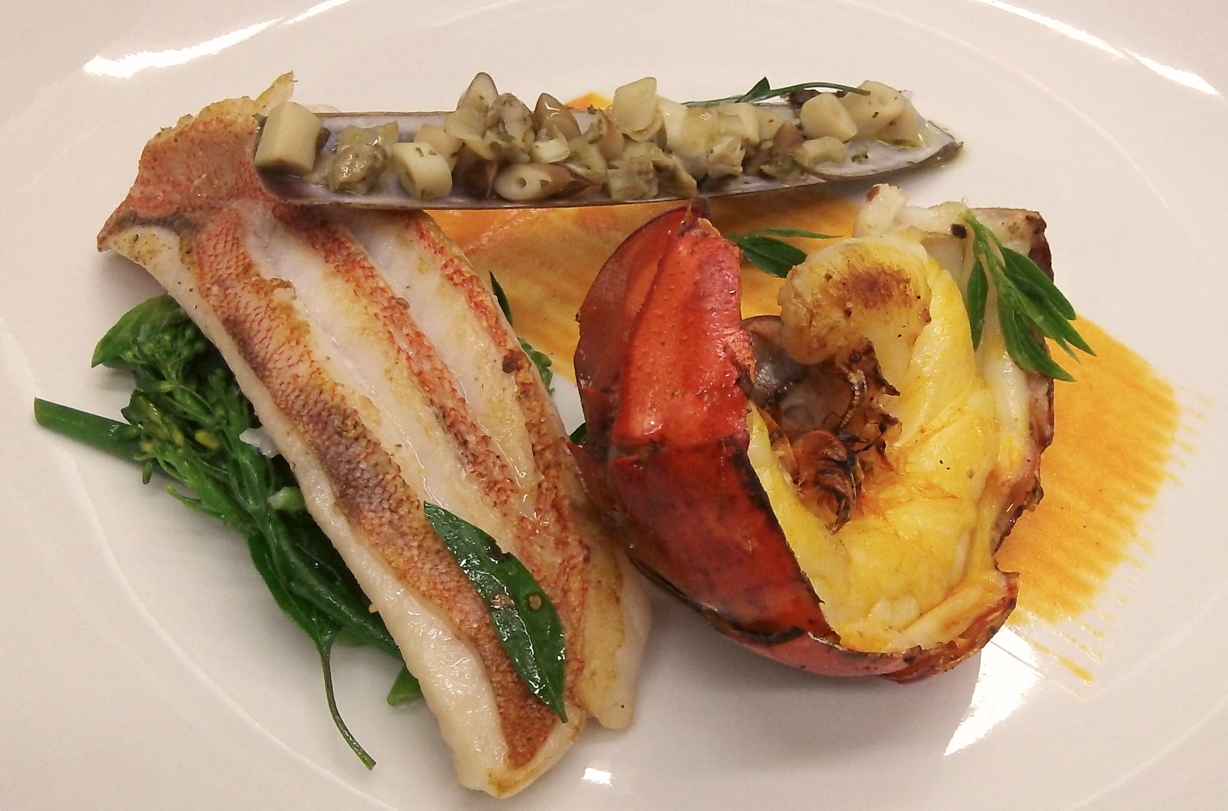 Arcadian Redfish with Madras Curried Lobster Tail, Pickled Razor Clams, Lambs' Quarters, Fricasse of Fall Vegetables, and Red Pepper Rouille
