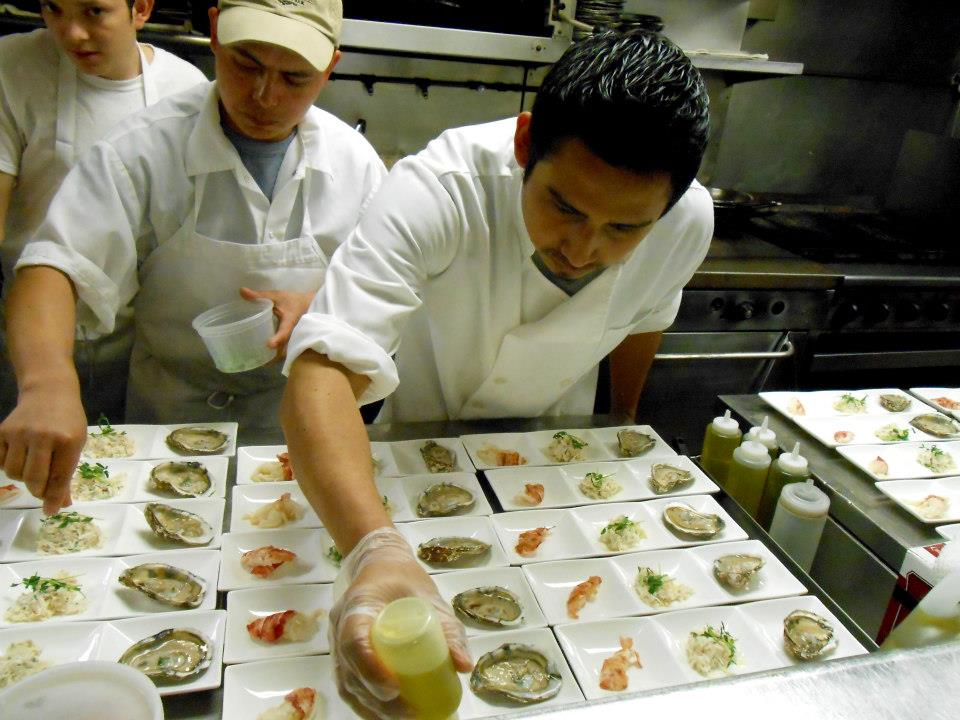 Garnishing the first course: Maine shellfish trio.