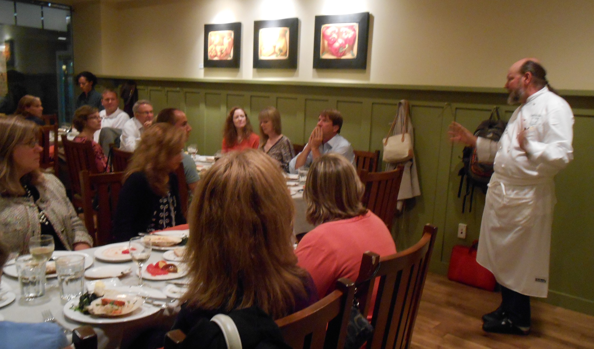 Chef Peter Davis engages in dialogue with the guests about the importance of knowing where your food comes from.