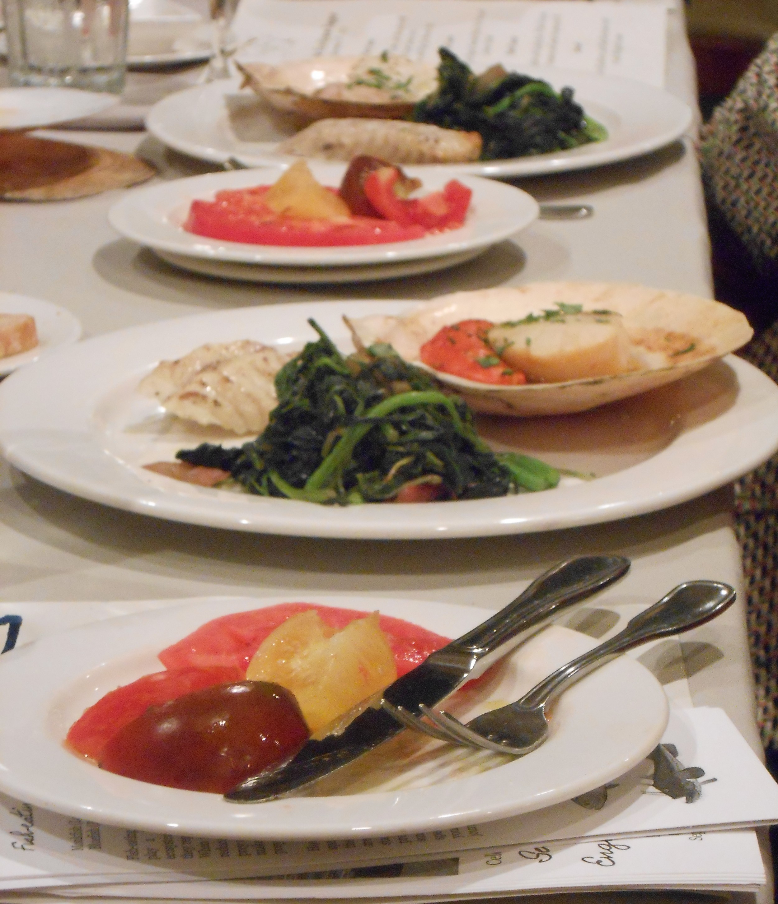 Seared Monkfish with Scallop Roe, Wilted Greens, Heirloom Tomatoes and Lemon Grape Seed Oil