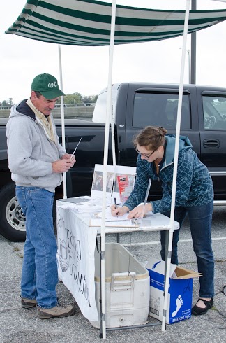 caitlin and rodman signing in.jpg