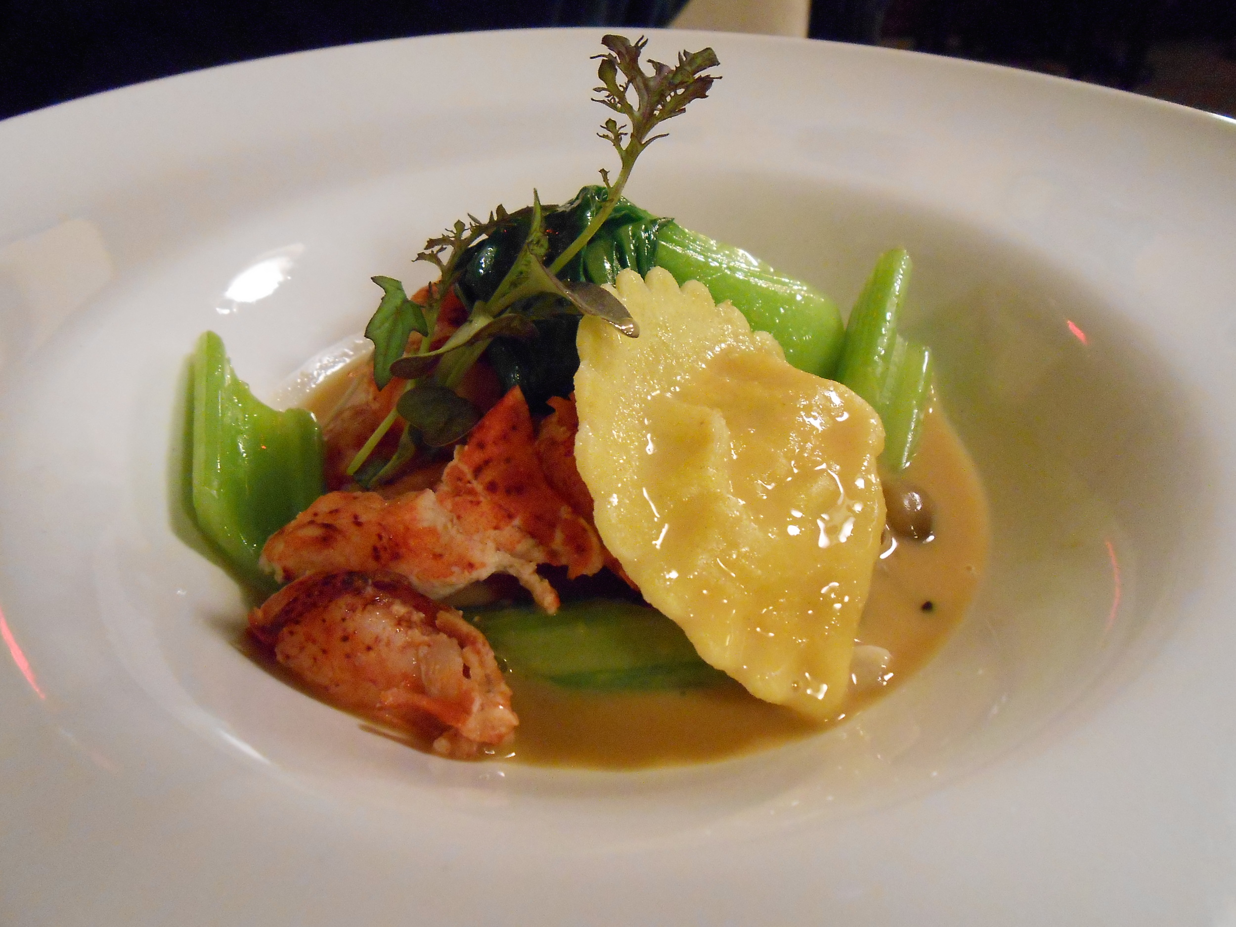 Fourth course: Butter-poached Lobster with Celery, Bok Choy, Beech Mushrooms, Shrimp Ravioli, and Lobster Broth