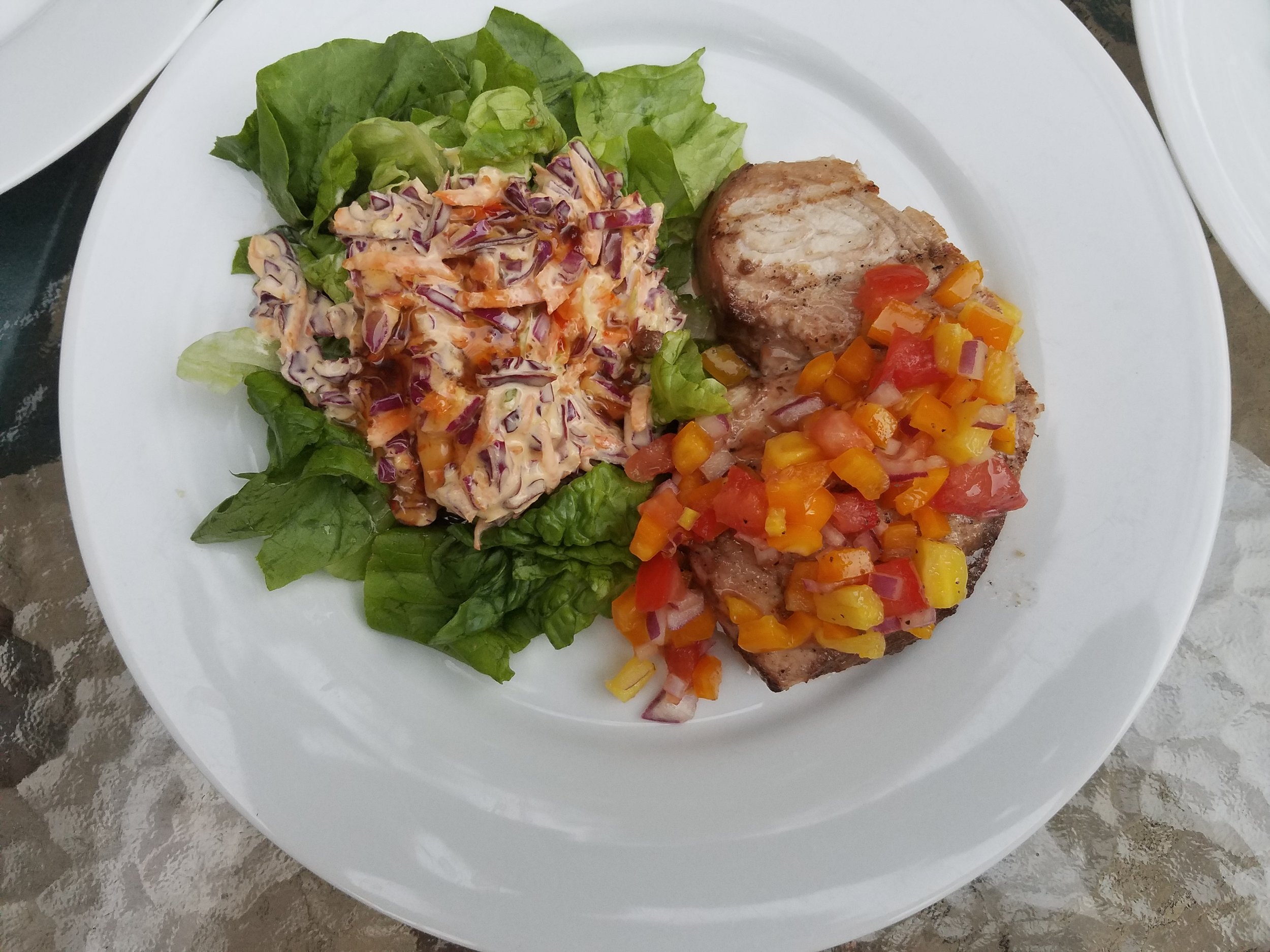 Grilled swordfish with pineapple salsa and asian slaw.