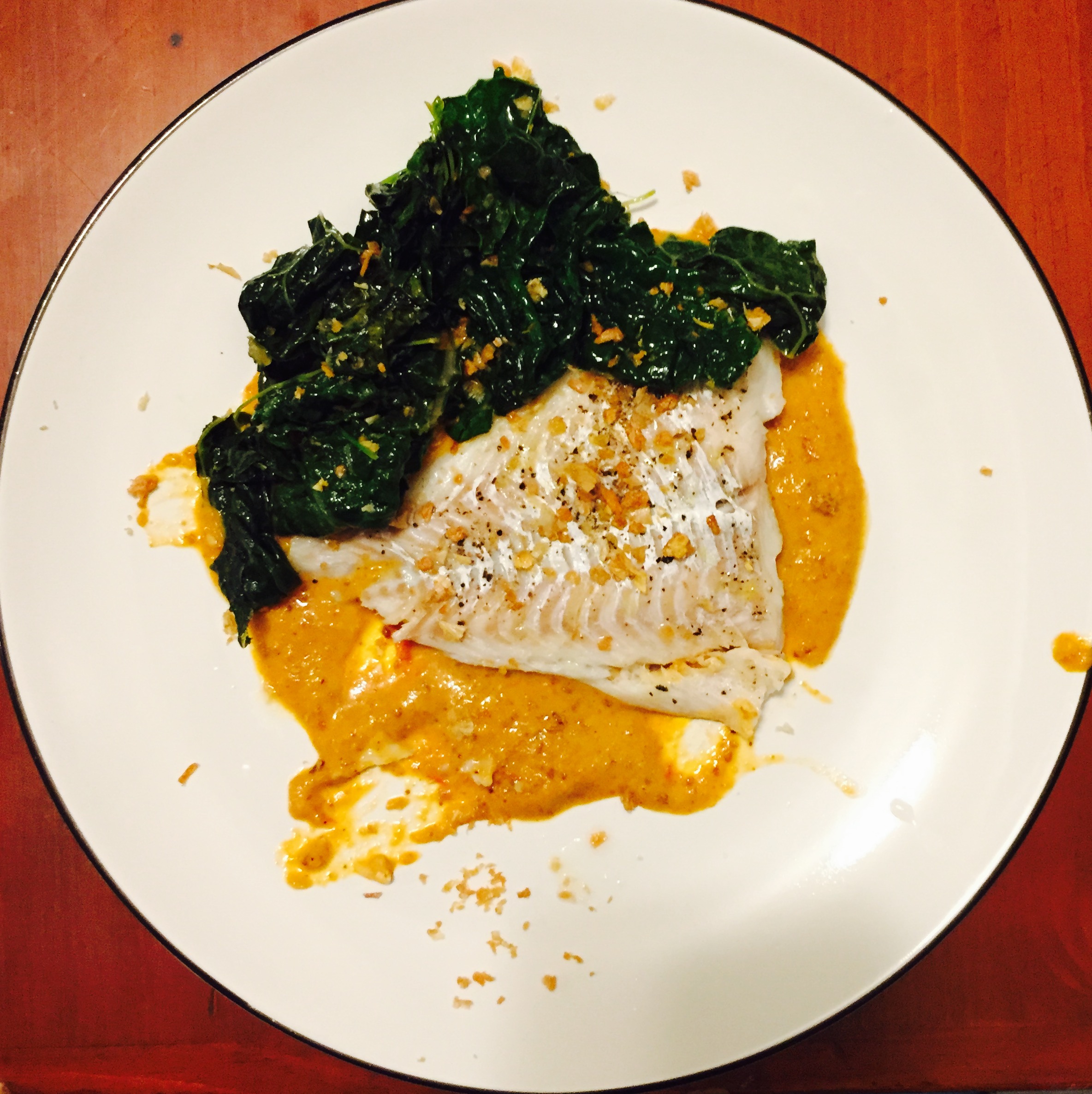 Steamed haddock with kale, bagna cauda and fried garlic.