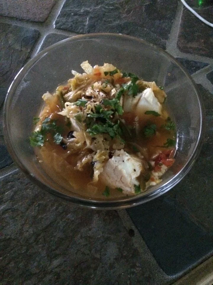 Southeast Asian fish stew with halibut and savoy cabbage