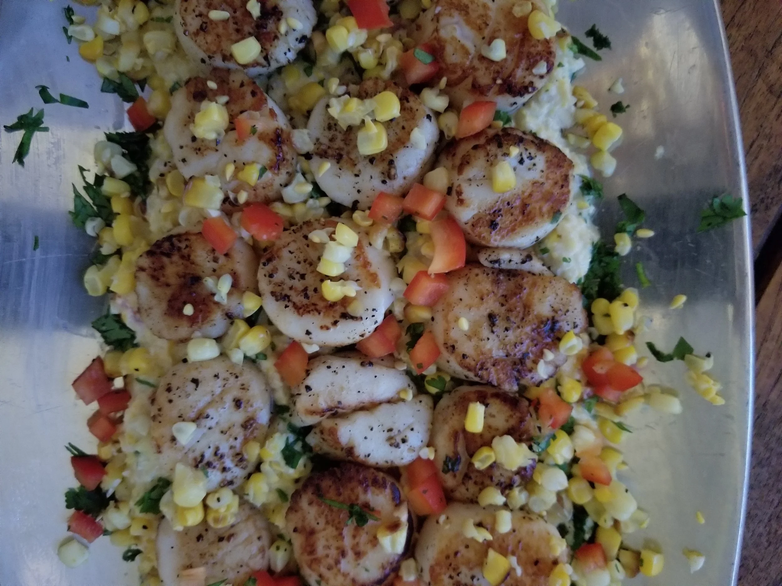 Seared sea scallops with creamed corn