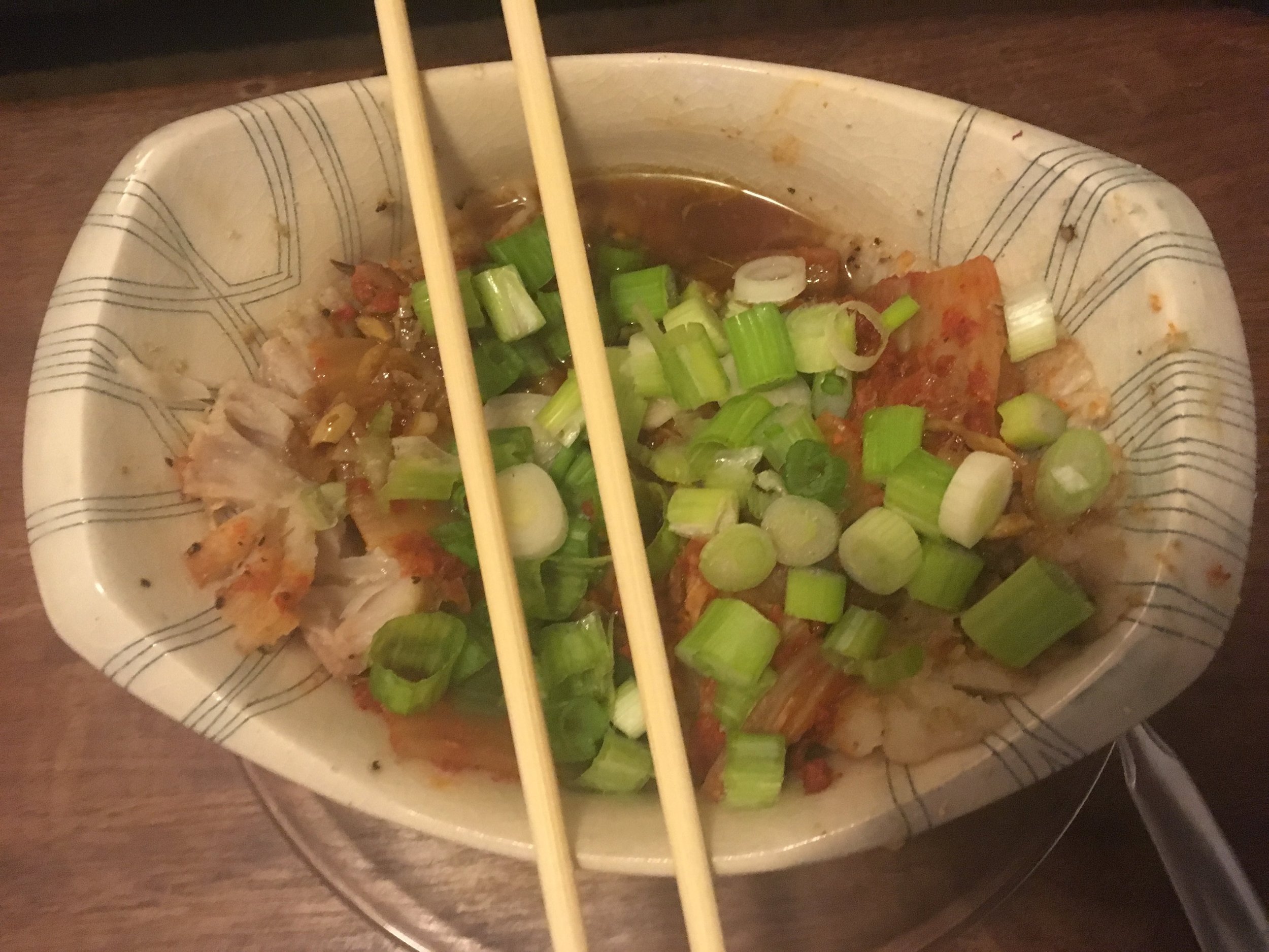 Steamed skate wing with scallions and kimchi