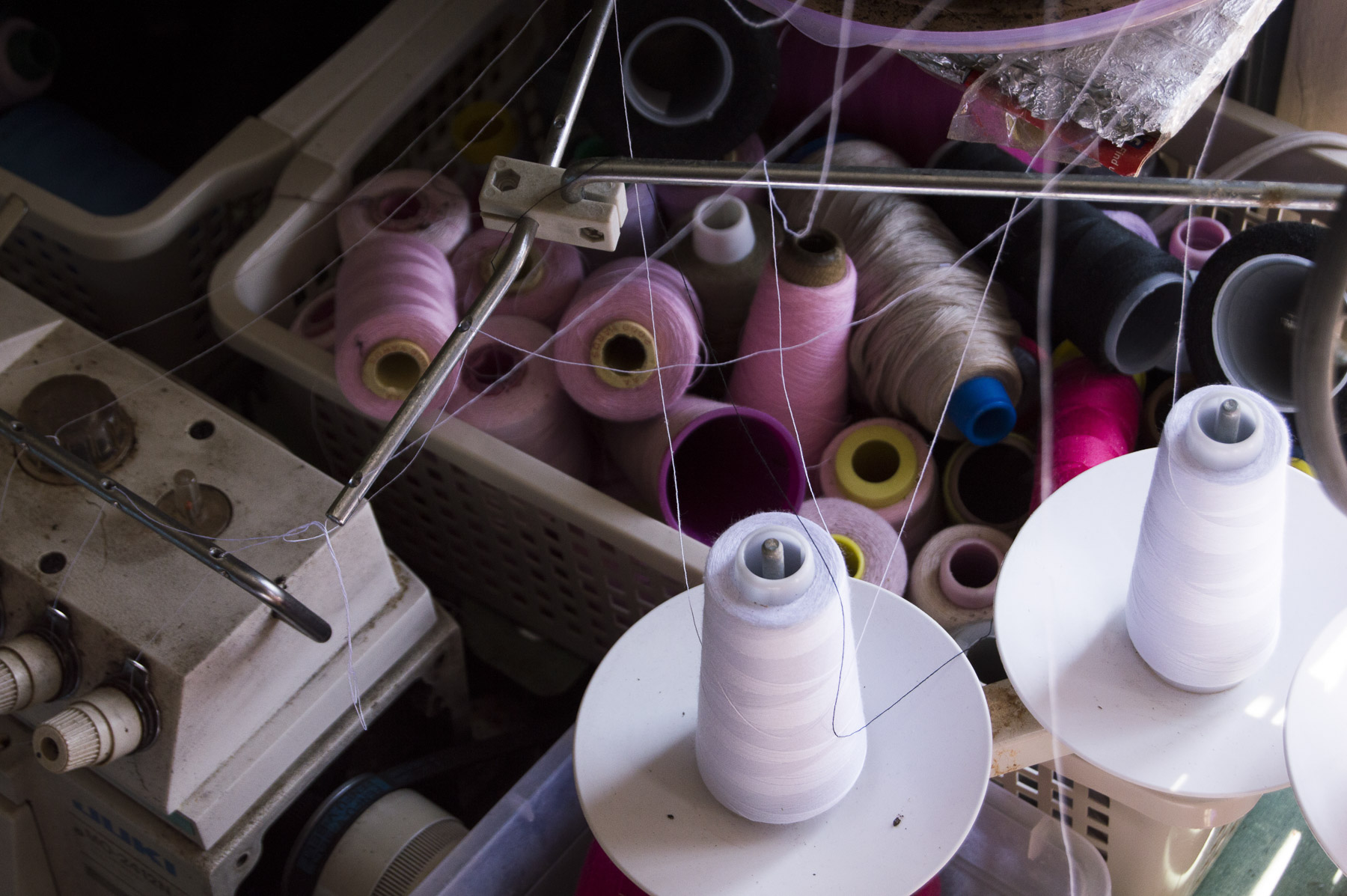  Spools of thread in a basket by Benito Bravo’s window. Next to them is the sewing machine Bravo uses to stitch the costumes for various events. Bravo uses colorful threads to create his own costumes.Gabrielle Narcisse and Deleelah Saleh for Picture 