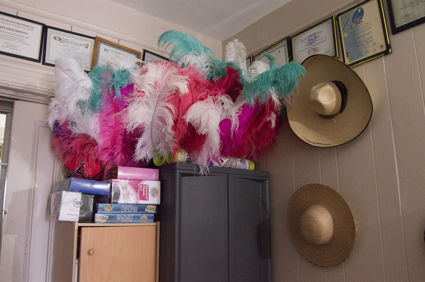  A room in Benito Bravo’s home that houses many costumes he’s collected from Indigenous people in Mexico and ones he’s made himself. Newspapers highlighting his performances and certificates line the walls, including one from the Brooklyn Borough Pre