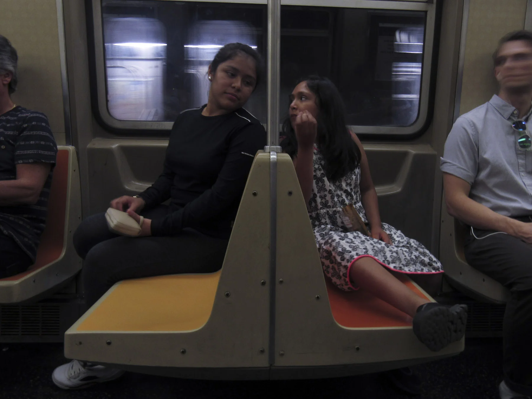 Heidi and her younger sister, Michelle, were separated from their mother for three years before the New York Sanctuary Coalition advocated for her release through protests and campaigns across the country. The two sisters, born in the United States, ride the subway beneath their native city, New York. New York City, New York – August 17, 2017