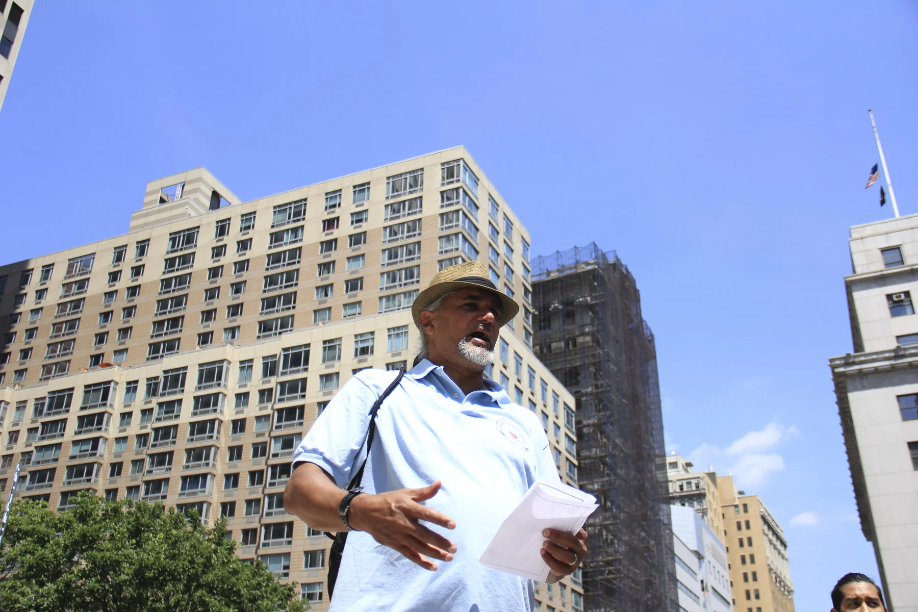Ravi tells the volunteers before beginning the Jericho walk on Thursday August 17, 2017 not to accept the unjust policies that have perpetuated racist stereotypes about all different immigrant communities. These assumptions have led to political, economic, and social discrimination in recent decades. Jacob K. Javitz Building at Federal Plaza, New York. August 17, 2017.