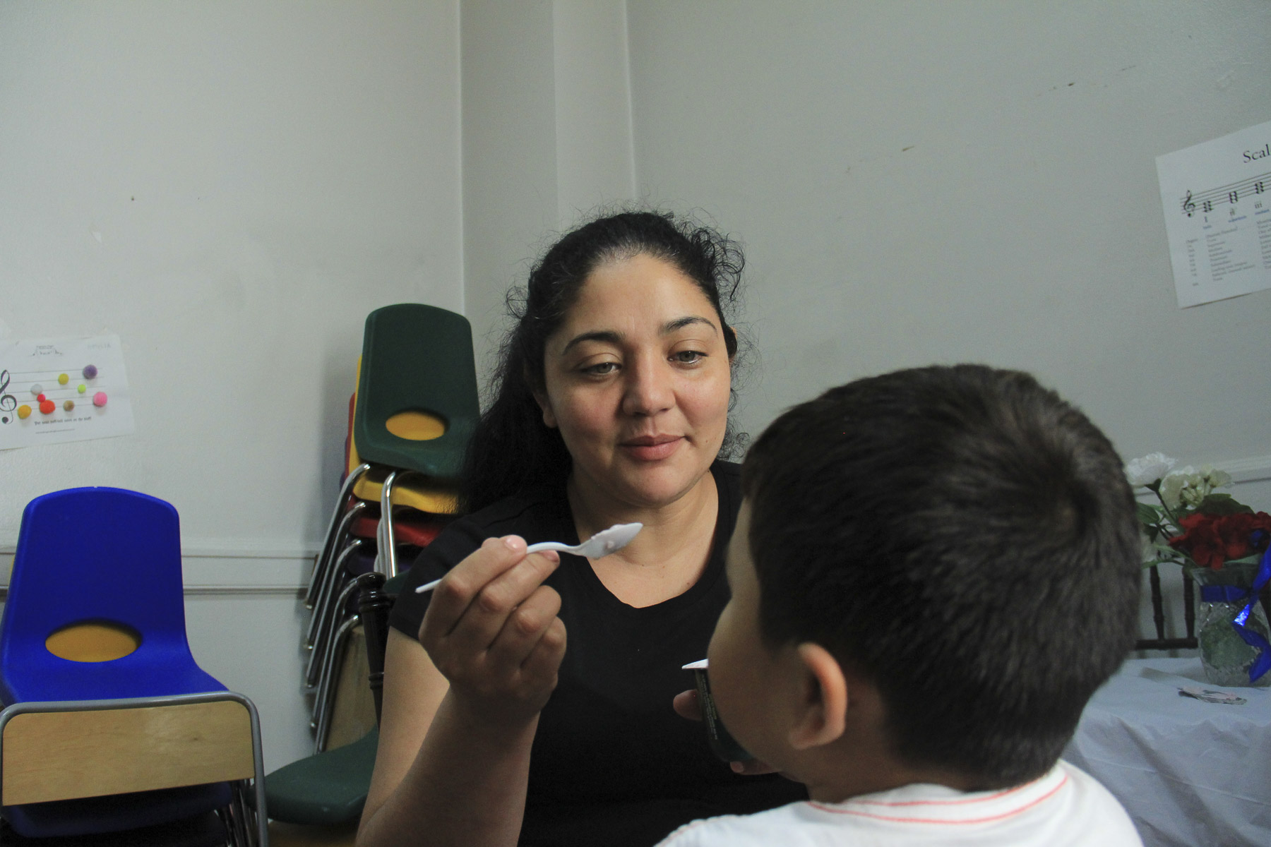  Amanda spends her days in sanctuary meeting with different newspapers and media sources in between playing with her children in their new home in the church library. Holyrood Episcopal Church in Washington Heights, New York. August 17, 2017. 