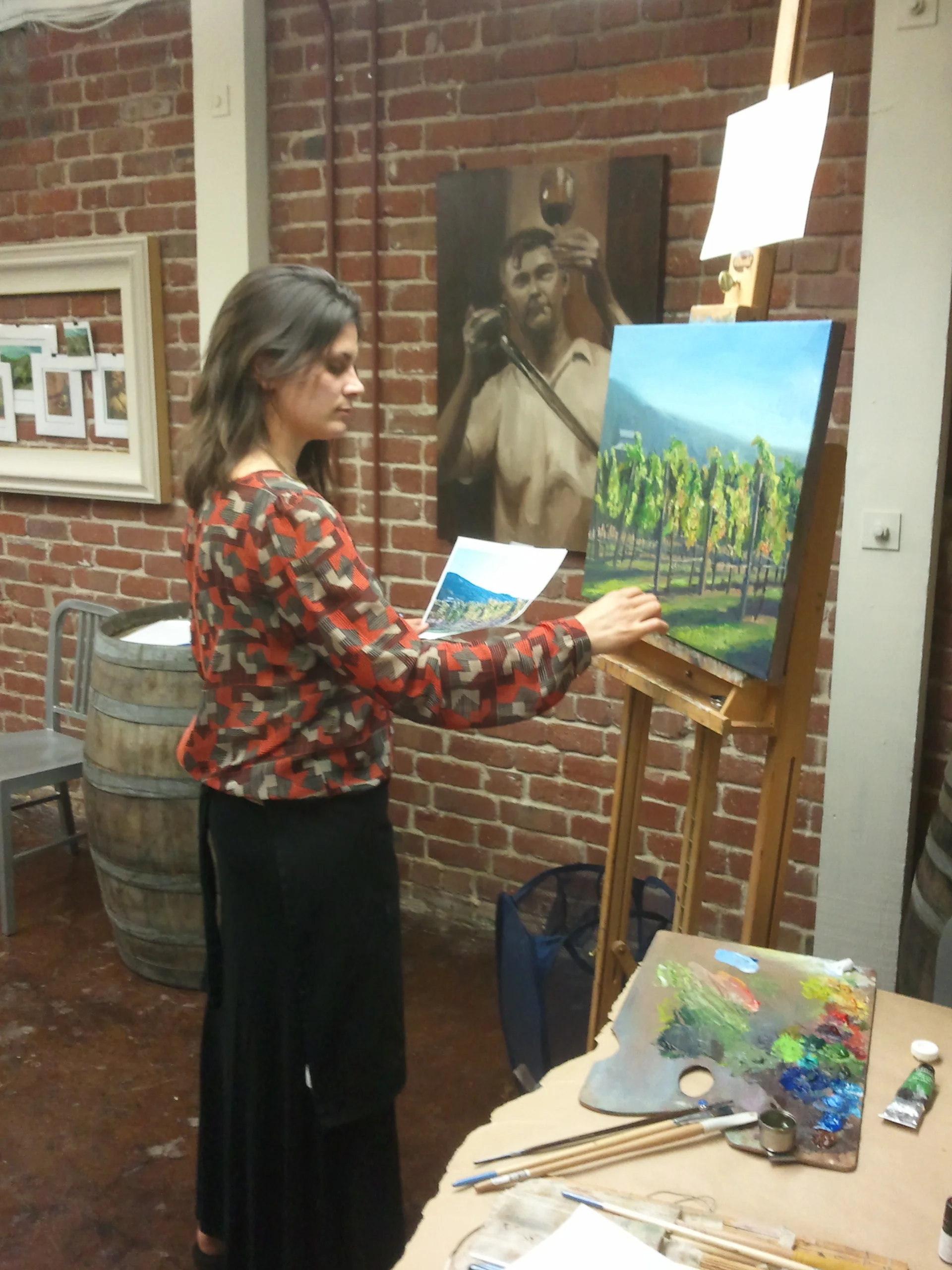 I was adding some finishing strokes to the raffle piece Sat. Night. Valued at $1500.00, folks could purchase tickets for $10.00 and by the end of the reception Sat. Night, someone would be getting their own Napa inspired vineyard painting. 