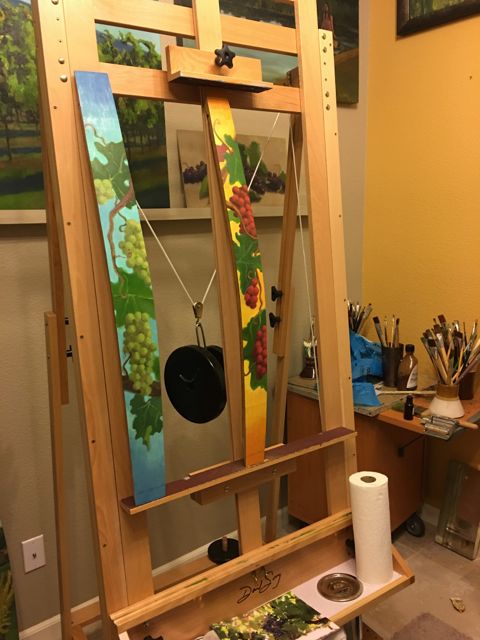 There are a few paintings on the easel right now. I am really enjoying my new surface - wine barrel staves.