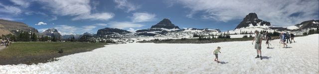 At the summit. Like I said it was warm, so we were in shorts and tanks, but surrounded by snow. The snow pack is so deep and massive that it keeps snow on these peaks all year round.