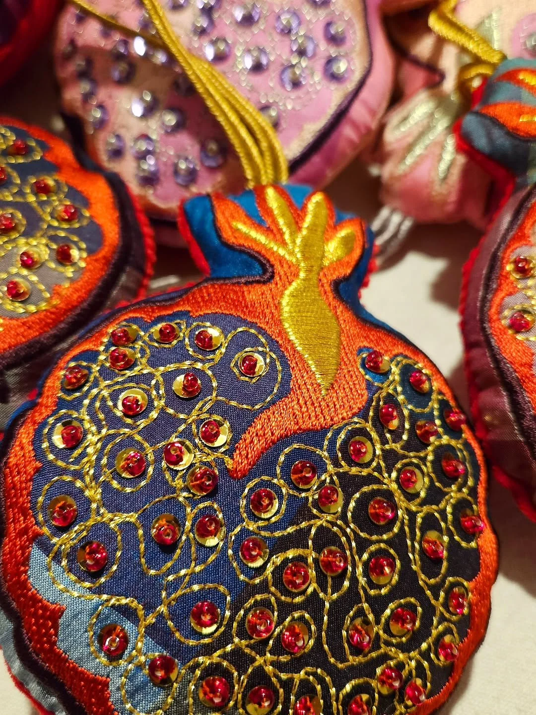 CALLING ALL LOVERS OF THE SHINY! (and pomegranates!)

 I'll be opening up the pre-order for my vintage silk embroidered and hand beaded pomegranate hanging decorations this week to my mailing list - sign up on my website so you don't miss out!
There 