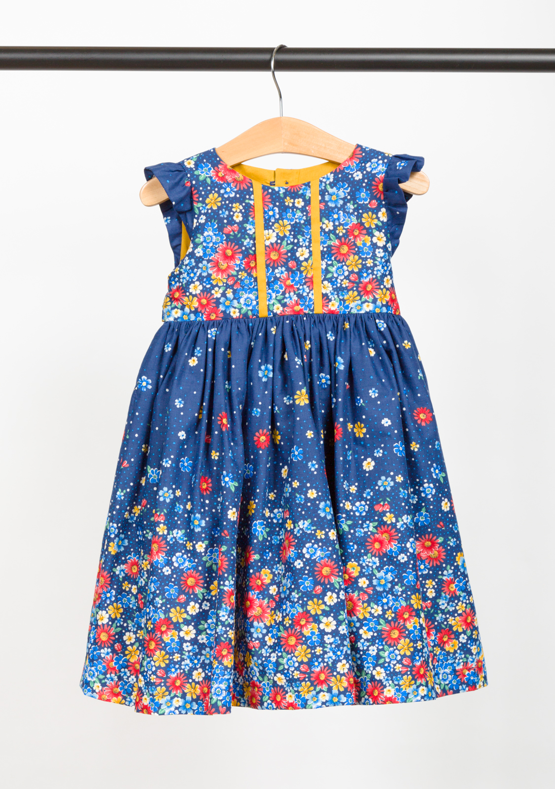 THE BIRTHDAY DRESS DESIGNED BY DEBBIE BROOKE DESIGNS , MADE BY PINK SUEDE SHOE , FEATURING LONDON CALLING (SRK- 16883-9)
