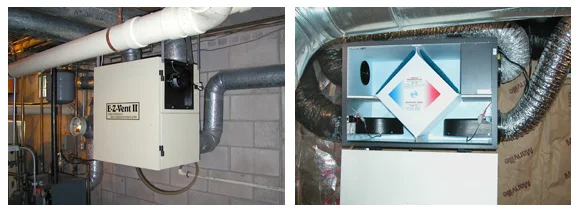 Two different brands of HRV units with 6" ductwork to outside vents near ground level.