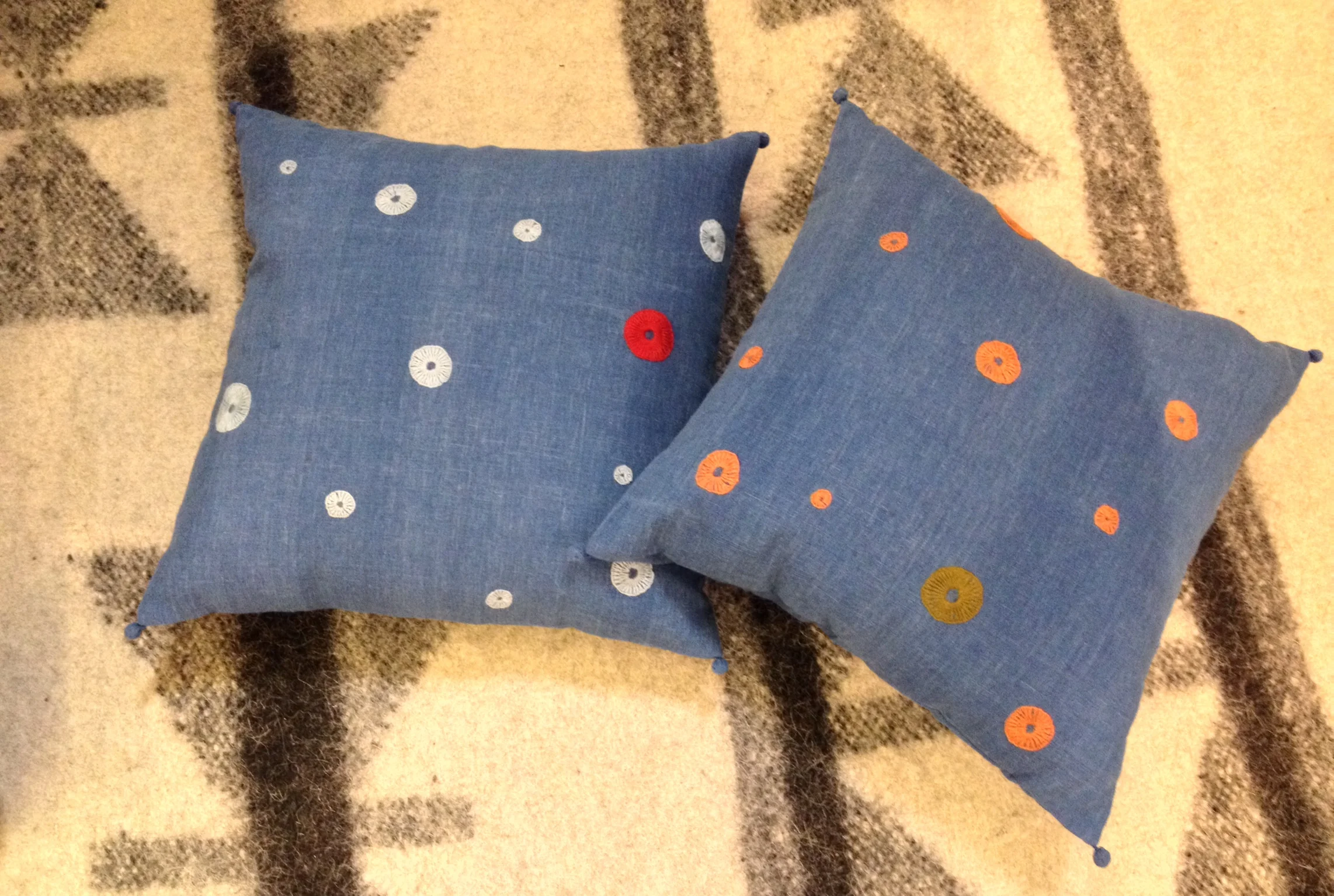 New Bindi embroidered cushions on hand woven indigo kala cotton