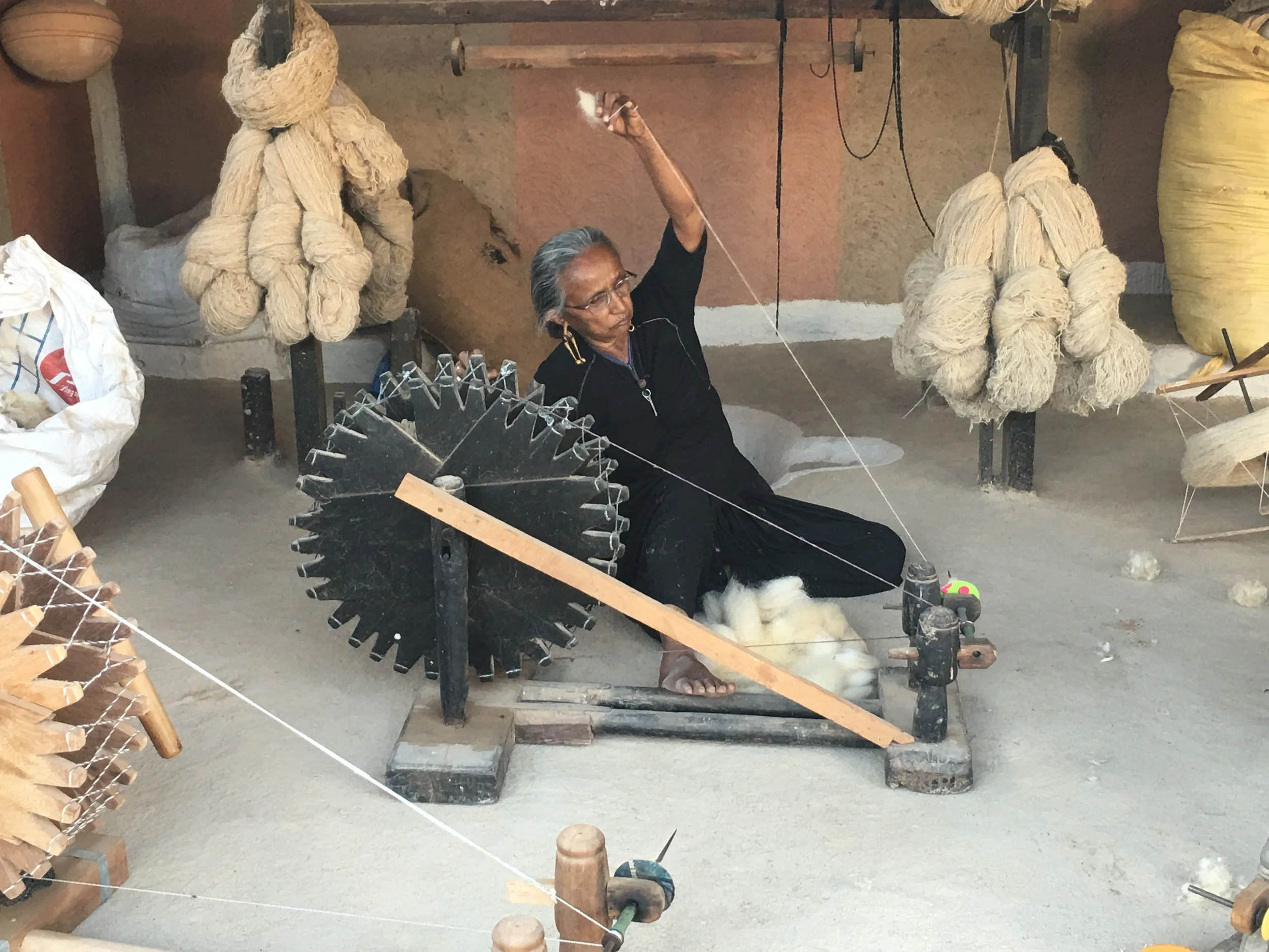 Rabari woman spinning