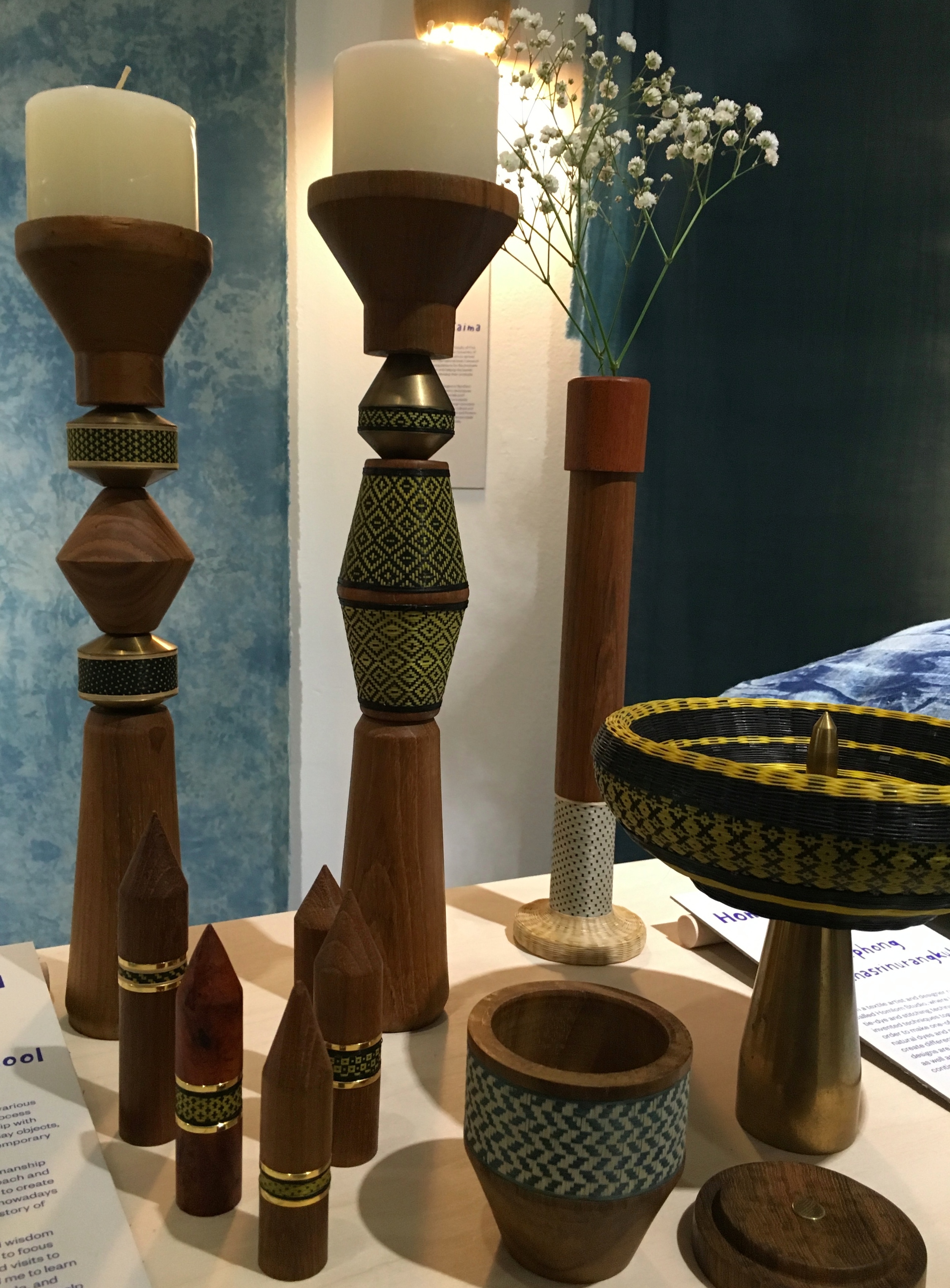 Pillar Candlesticks, rings and vessels from Thai designer-makers Patapian . Combining Thai wicker weaving techniques with other local craft skills.