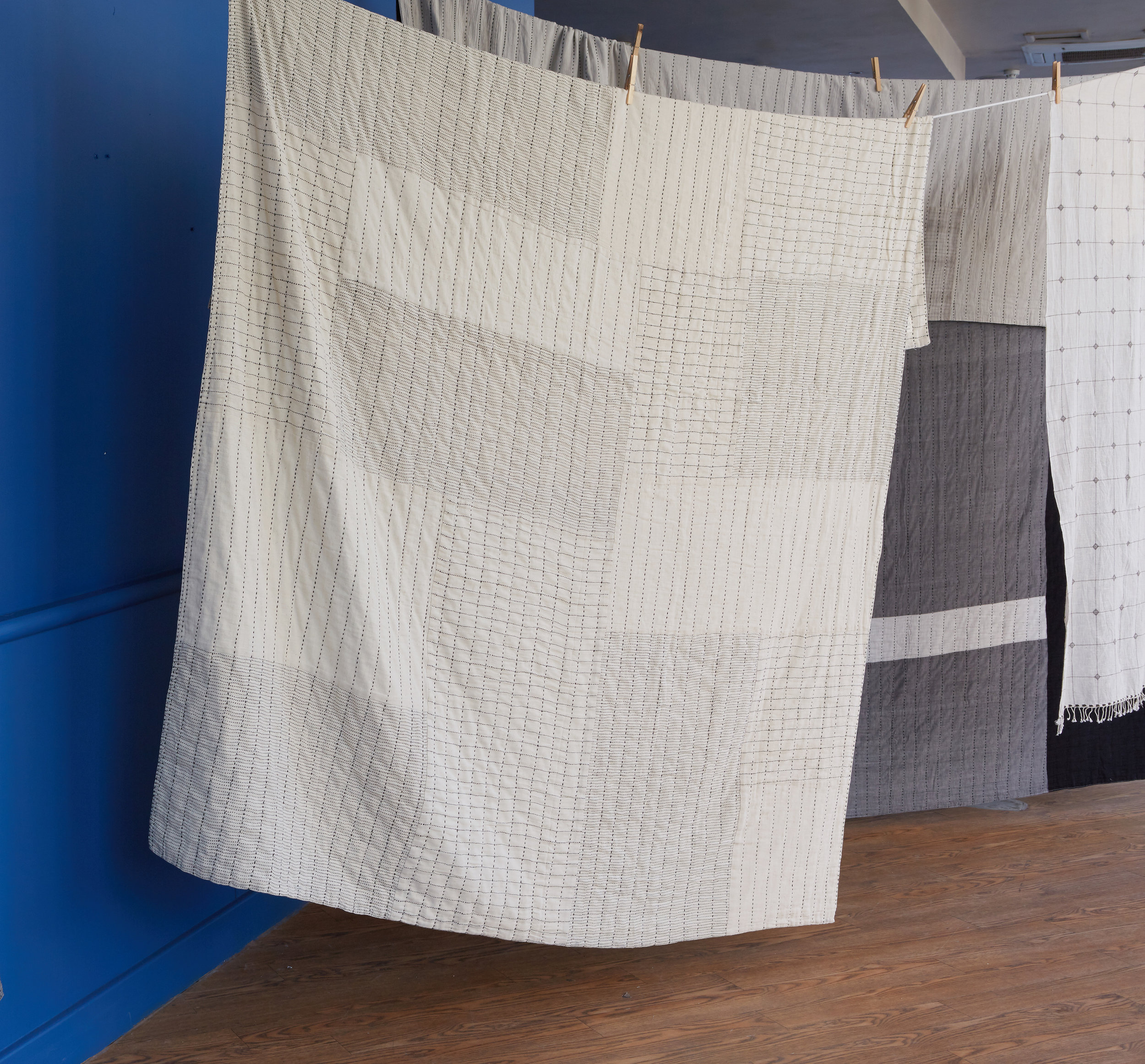 New block printed and kantha-stitched quilt in unbleached, organic kala cotton fabrics