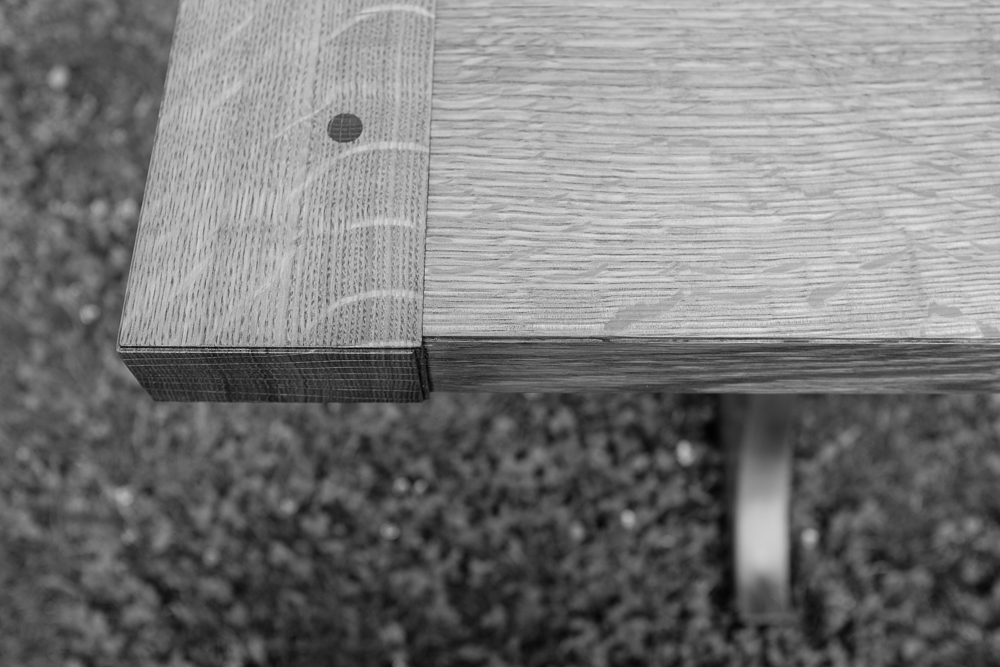 Breadboard end. Draw-pegged mortise and tenon joinery holds them in place.