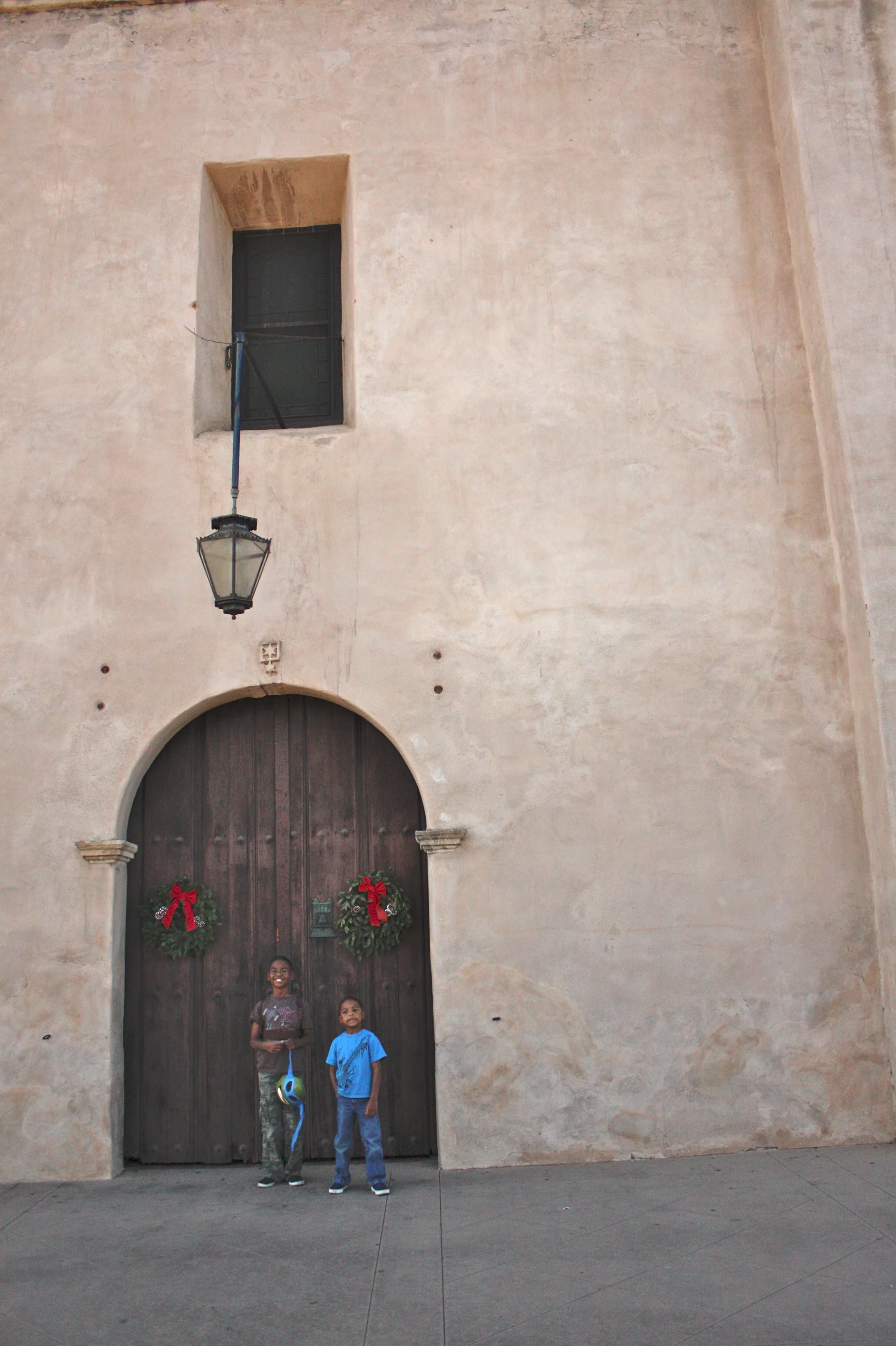 The boys in front of the mission.