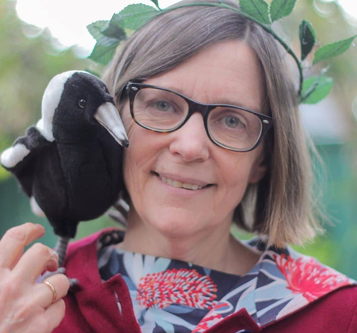 Ursula Dubosarsky headshot wreath and magpie.PNG