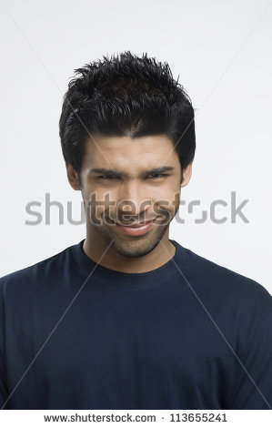 stock-photo-close-up-of-a-man-smirking-113655241.jpg