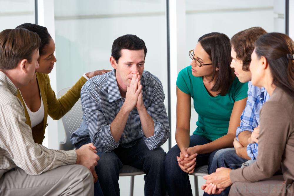 man-talking-with-small-group.jpg
