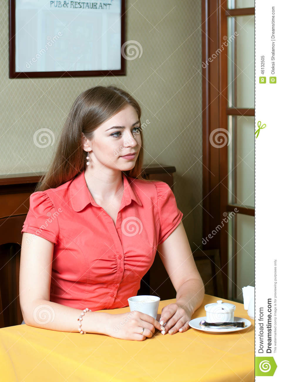woman-sitting-restaurant-cup-coffee-looks-out-young-window-46132505.jpg