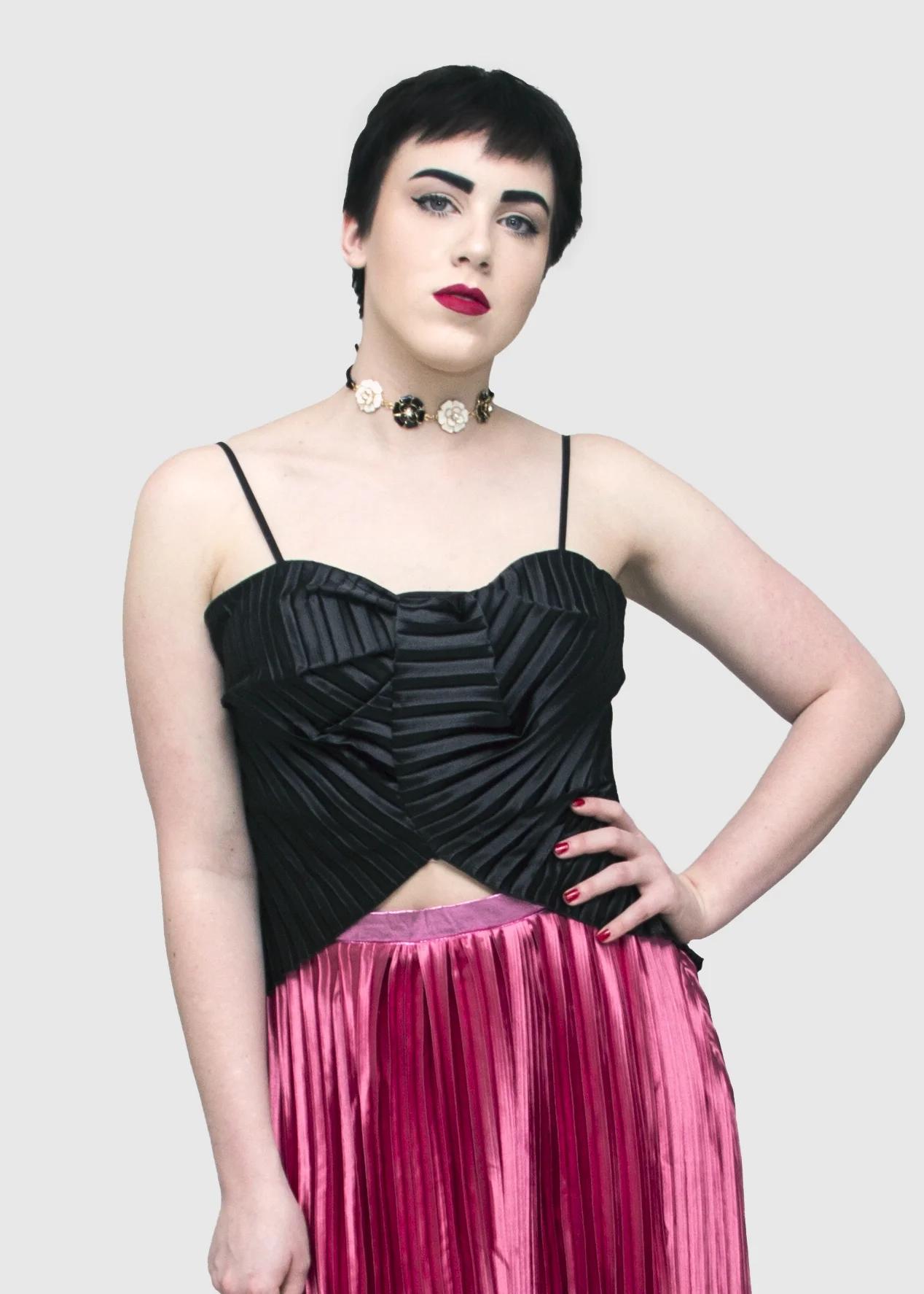 Maddy In pleated pink skirt and black pleated christian top front 3.jpg